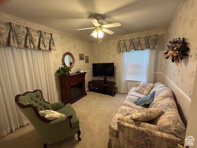 1567 E Westminster Ave, Salt Lake City, UT 84105 - living area featuring wallpapered walls, light carpet, ceiling fan, and a glass covered fireplace