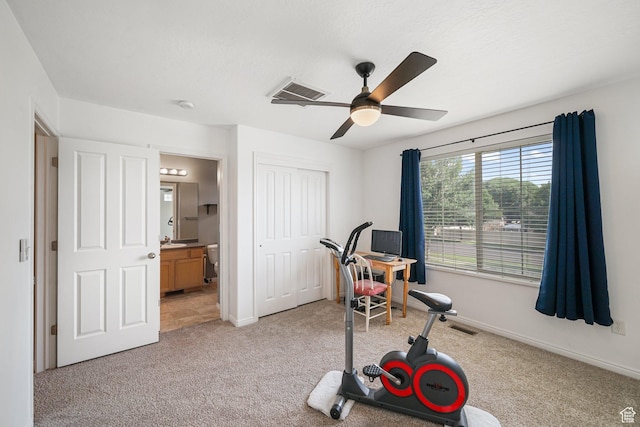 1051 W Castleton Dr, North Salt Lake, UT 84054 - exercise room with light colored carpet and ceiling fan