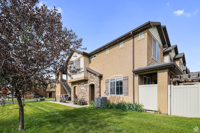 1051 W Castleton Dr, North Salt Lake, UT 84054 - back of property with stucco siding and stone siding