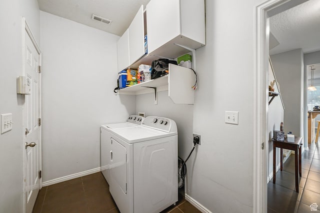 1051 W Castleton Dr, North Salt Lake, UT 84054 - laundry area featuring separate washer and dryer and dark tile patterned floors