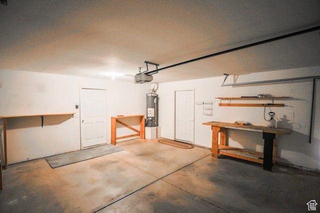 562 S 400 E, Ivins, UT 84738 - garage with water heater, a garage door opener, and a workshop area