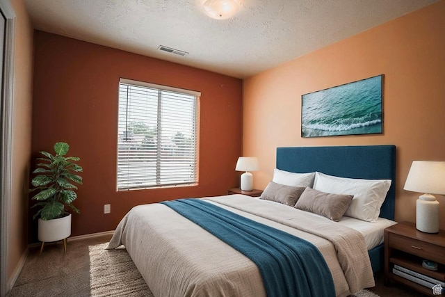 562 S 400 E, Ivins, UT 84738 - carpeted bedroom featuring baseboards and a textured ceiling