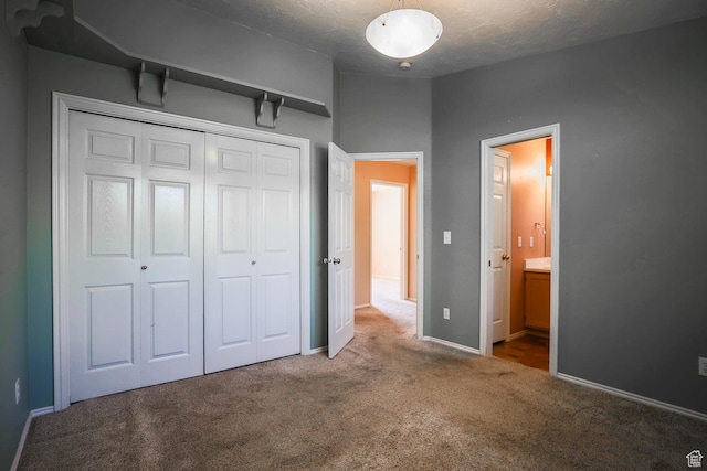 562 S 400 E, Ivins, UT 84738 - unfurnished bedroom with carpet, a closet, and ensuite bathroom