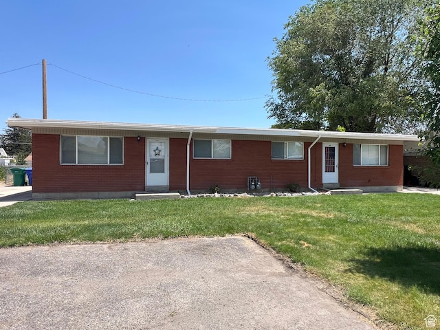 856 N 600 E, Lehi, UT 84043 - single story home featuring entry steps, brick siding, and a front yard