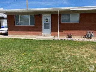856 N 600 E, Lehi, UT 84043 - ranch-style home with a front lawn and a carport