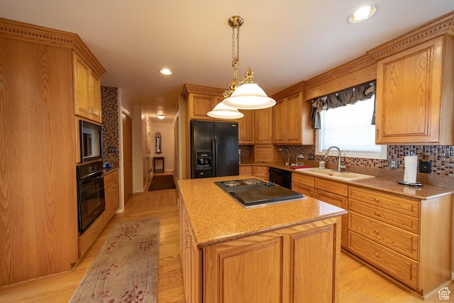 1416 W Valley View Dr, Wellington, UT 84542 - kitchen with black appliances, light wood finished floors, tasteful backsplash, a kitchen island, and recessed lighting