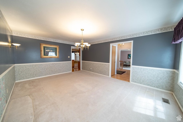 1416 W Valley View Dr, Wellington, UT 84542 - unfurnished room with a chandelier, wallpapered walls, carpet, and wainscoting