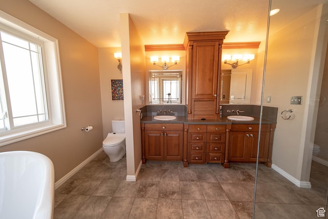 1416 W Valley View Dr, Wellington, UT 84542 - bathroom with double vanity, a freestanding tub, and tile patterned flooring