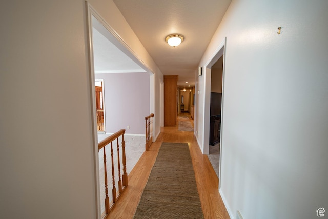 1416 W Valley View Dr, Wellington, UT 84542 - hall featuring an upstairs landing and light wood-type flooring