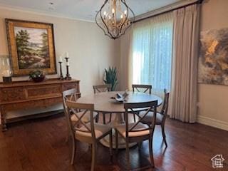 1706 E Murray Holladay Rd S Unit 204, Holladay, UT 84117 - dining room featuring a chandelier, wood finished floors, and crown molding