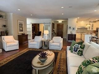 1706 E Murray Holladay Rd S Unit 204, Holladay, UT 84117 - living room featuring wood finished floors and recessed lighting