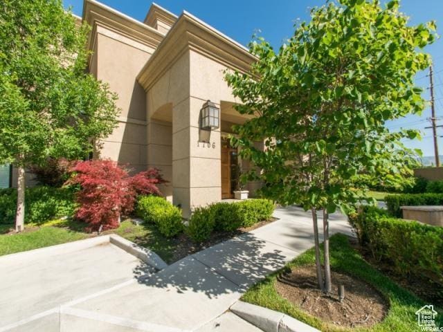 1706 E Murray Holladay Rd S Unit 204, Holladay, UT 84117 - view of property exterior with stucco siding