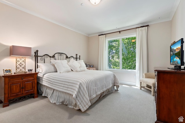 1706 E Murray Holladay Rd S Unit 204, Holladay, UT 84117 - bedroom with light carpet and ornamental molding