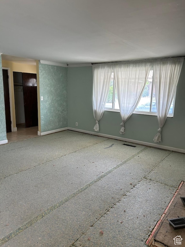 2784 W 2890 S, West Valley City, UT 84119 - unfurnished room featuring baseboards and crown molding