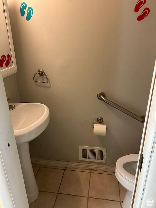 2784 W 2890 S, West Valley City, UT 84119 - bathroom with tile patterned flooring and toilet