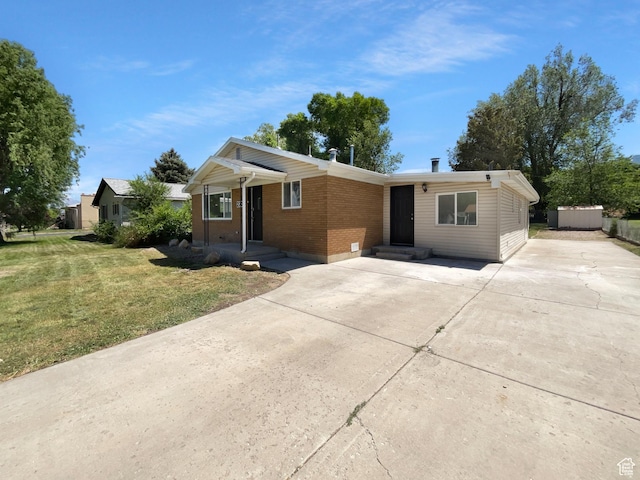 270 N 500 E, Spanish Fork, UT 84660 - ranch-style home featuring brick siding, a front yard, driveway, and a shed