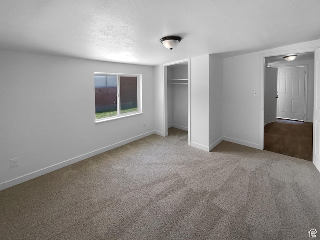 270 N 500 E, Spanish Fork, UT 84660 - unfurnished bedroom featuring carpet flooring, a closet, and a textured ceiling