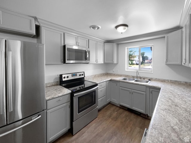 270 N 500 E, Spanish Fork, UT 84660 - kitchen featuring stainless steel appliances, gray cabinets, dark wood-style floors, and light countertops