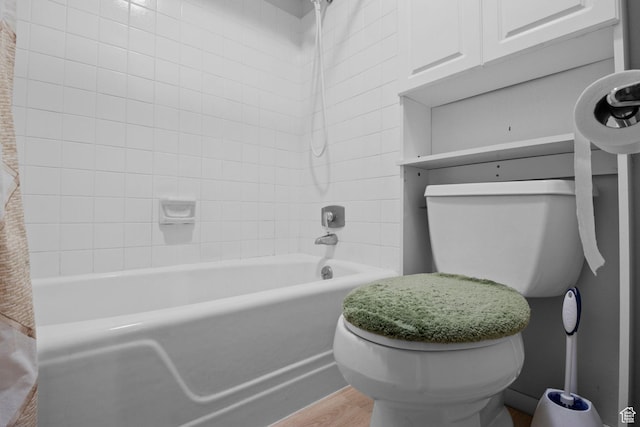 771 E 17th Ave, Salt Lake City, UT 84103 - bathroom featuring shower / washtub combination and wood finished floors