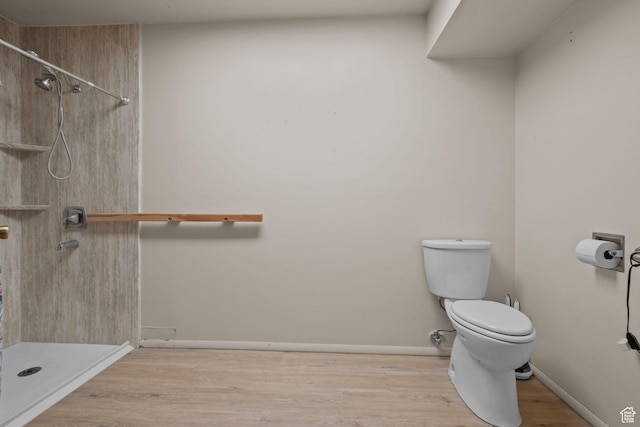 771 E 17th Ave, Salt Lake City, UT 84103 - bathroom featuring a shower and wood finished floors