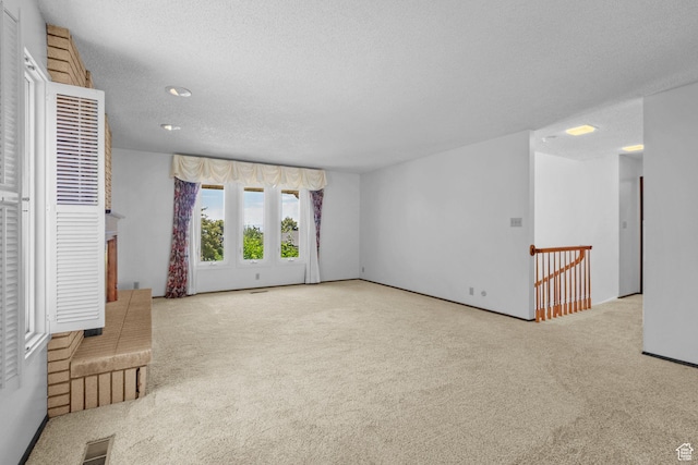 771 E 17th Ave, Salt Lake City, UT 84103 - unfurnished room with carpet flooring and a textured ceiling