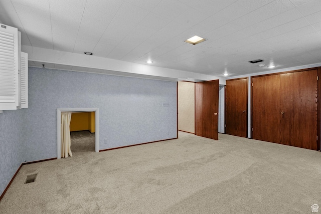 771 E 17th Ave, Salt Lake City, UT 84103 - unfurnished bedroom with carpet flooring and two closets