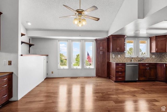 771 E 17th Ave, Salt Lake City, UT 84103 - kitchen featuring dishwasher, a textured ceiling, a ceiling fan, healthy amount of natural light, and lofted ceiling
