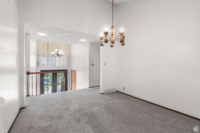 771 E 17th Ave, Salt Lake City, UT 84103 - carpeted spare room with a chandelier and a towering ceiling