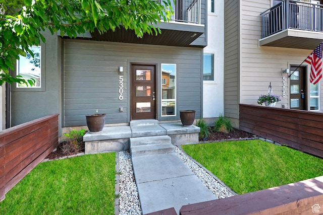 5306 W Solafax Ln, Herriman, UT 84096 - doorway to property featuring a balcony and a porch
