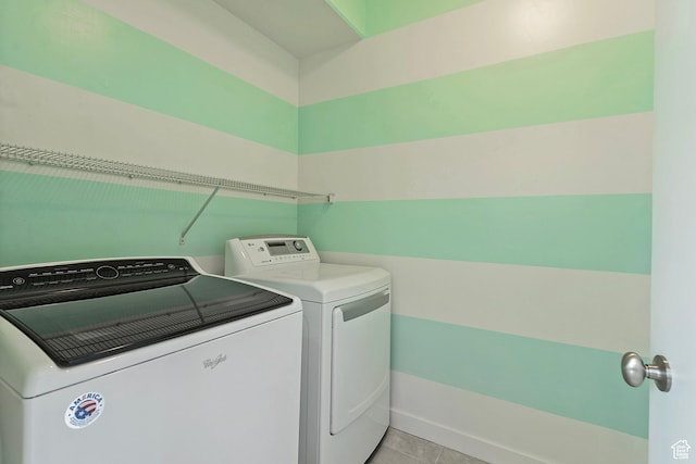 5306 W Solafax Ln, Herriman, UT 84096 - laundry area with washer and clothes dryer and light tile patterned floors
