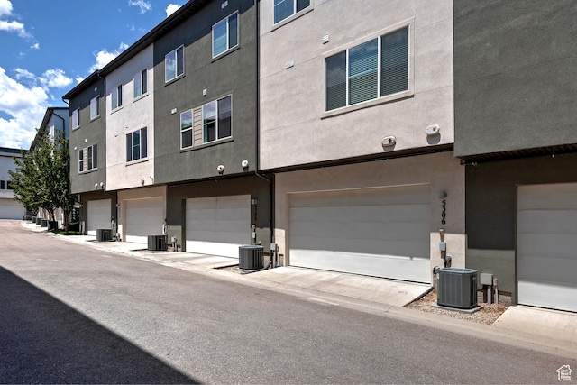 5306 W Solafax Ln, Herriman, UT 84096 - back of property with stucco siding and a garage