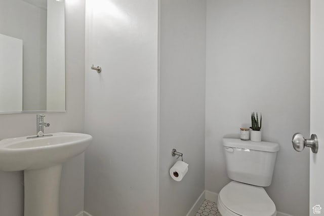 5306 W Solafax Ln, Herriman, UT 84096 - bathroom featuring toilet and baseboards