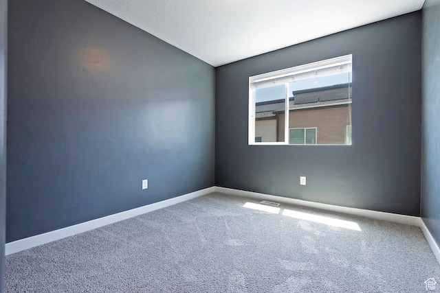 5306 W Solafax Ln, Herriman, UT 84096 - empty room featuring lofted ceiling and carpet floors