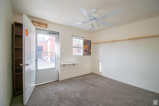 305 S Sheridan St, Stockton, UT 84071 - carpeted empty room featuring a ceiling fan