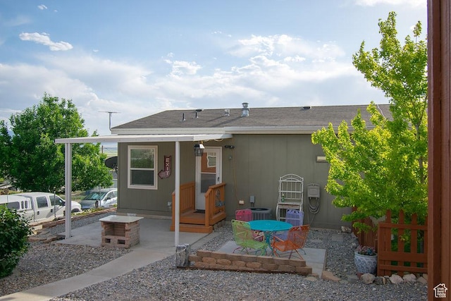 305 S Sheridan St, Stockton, UT 84071 - rear view of house featuring a patio area