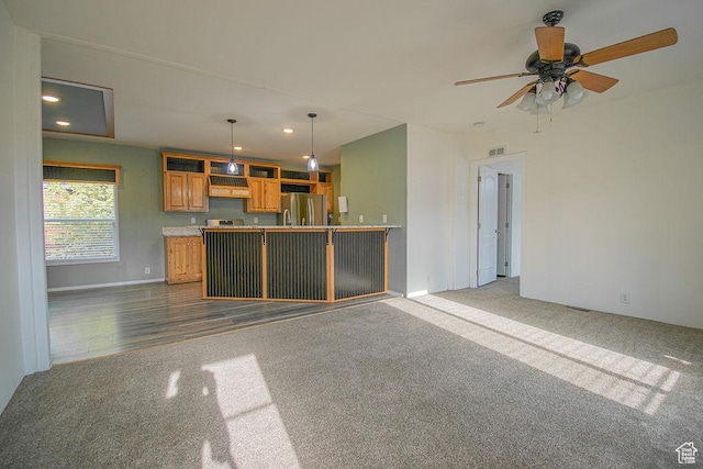 305 S Sheridan St, Stockton, UT 84071 - kitchen with freestanding refrigerator, dark carpet, recessed lighting, a ceiling fan, and decorative light fixtures
