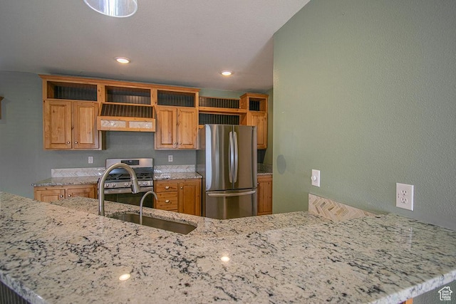 305 S Sheridan St, Stockton, UT 84071 - kitchen with appliances with stainless steel finishes, open shelves, light stone counters, brown cabinetry, and recessed lighting
