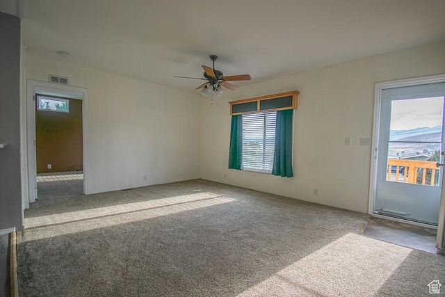305 S Sheridan St, Stockton, UT 84071 - carpeted empty room featuring a ceiling fan