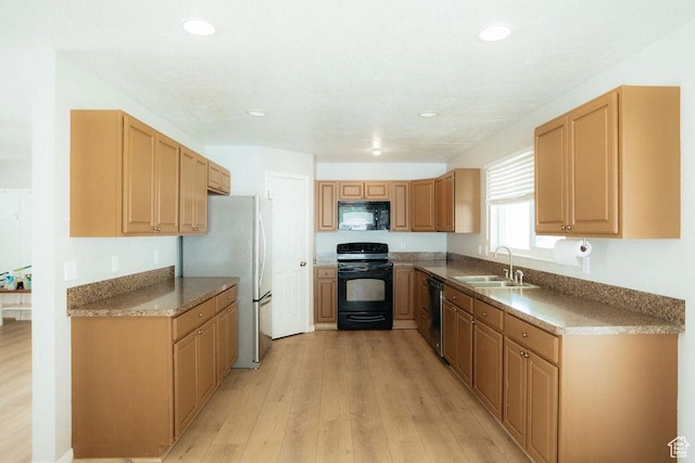 571 E Center St, Kaysville, UT 84037 - kitchen with black appliances, light wood-style flooring, and recessed lighting