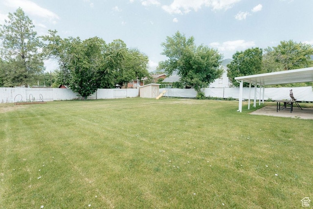 571 E Center St, Kaysville, UT 84037 - fenced backyard with a patio area