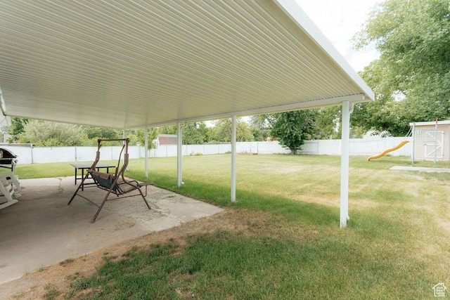 571 E Center St, Kaysville, UT 84037 - fenced backyard featuring a patio and a playground