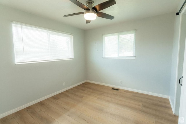 571 E Center St, Kaysville, UT 84037 - spare room with light wood finished floors and a ceiling fan