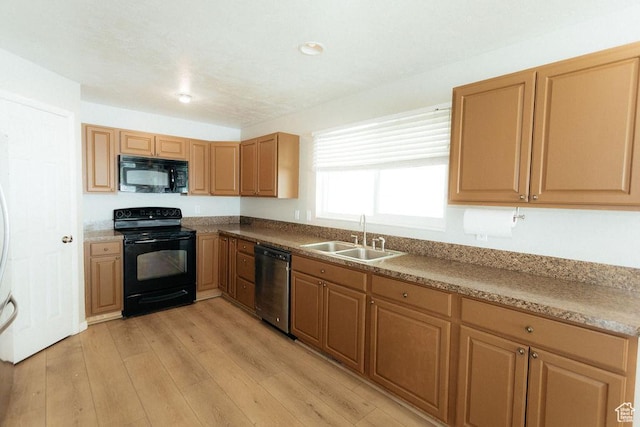 571 E Center St, Kaysville, UT 84037 - kitchen with black appliances, light wood-type flooring, and recessed lighting