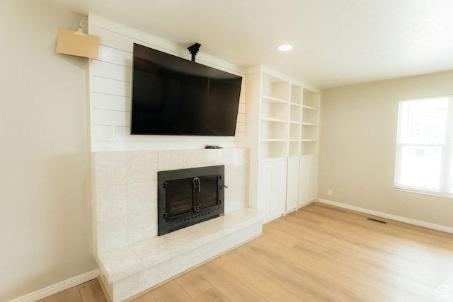 571 E Center St, Kaysville, UT 84037 - unfurnished living room featuring wood finished floors, a fireplace, and recessed lighting