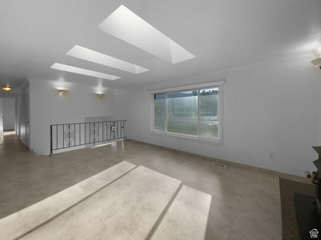 1175 N 1100 W, West Bountiful, UT 84087 - empty room with a skylight and finished concrete floors