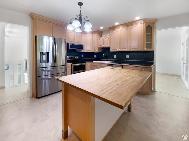 1175 N 1100 W, West Bountiful, UT 84087 - kitchen with appliances with stainless steel finishes, light brown cabinets, glass insert cabinets, tasteful backsplash, and a chandelier
