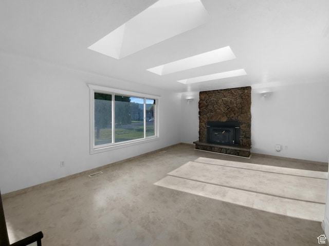 1175 N 1100 W, West Bountiful, UT 84087 - unfurnished living room with a skylight, a fireplace, and carpet flooring