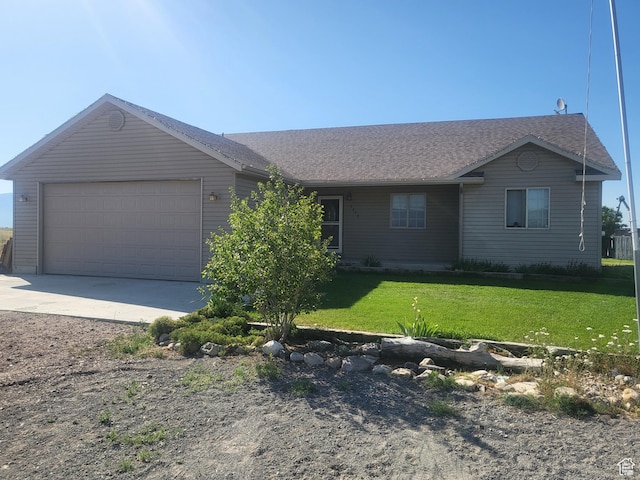 2673 S 2400 W, Weston, ID 83286 - ranch-style home featuring driveway, an attached garage, and a front yard
