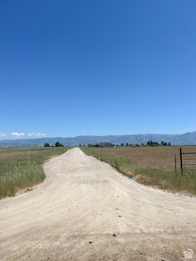 2673 S 2400 W, Weston, ID 83286 - view of dirt / gravel road featuring a view of rural / pastoral area and a mountain view