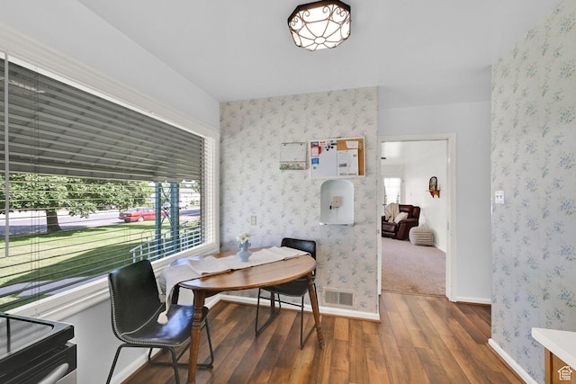 506 N 100 E, Brigham City, UT 84302 - dining area with wood-type flooring and wallpapered walls